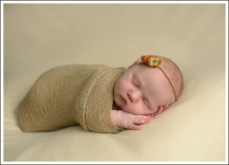 baby_in_wrap_and_headband