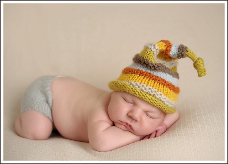 new-baby-in-striped-hat