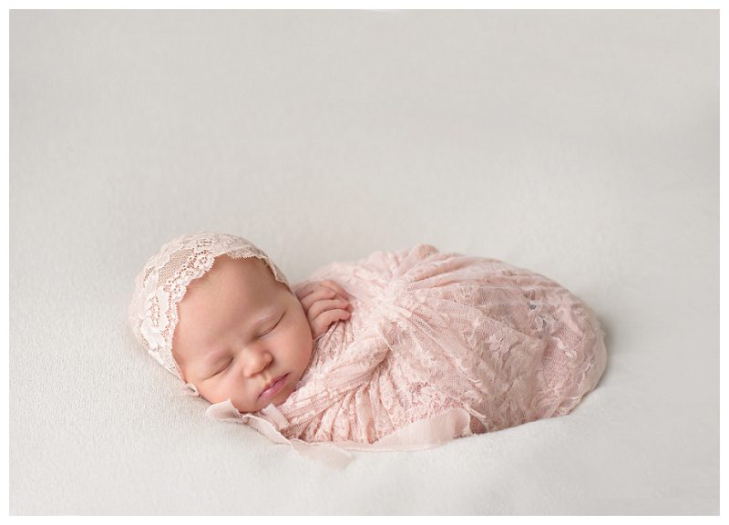 newborn-in-lace-bonnet-and-wrap