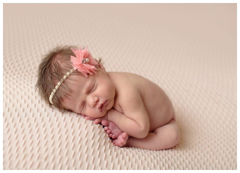 newborn-girl-peach-blanket