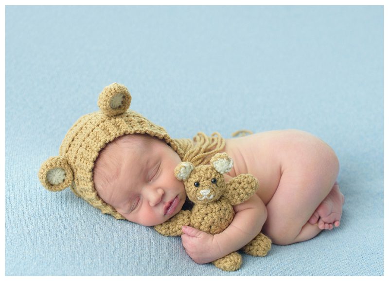 newborn-with-knit-teddy-and-teddy-hat
