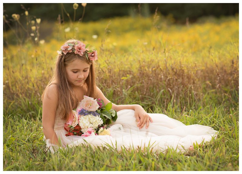 girl-with-flowers-in-field