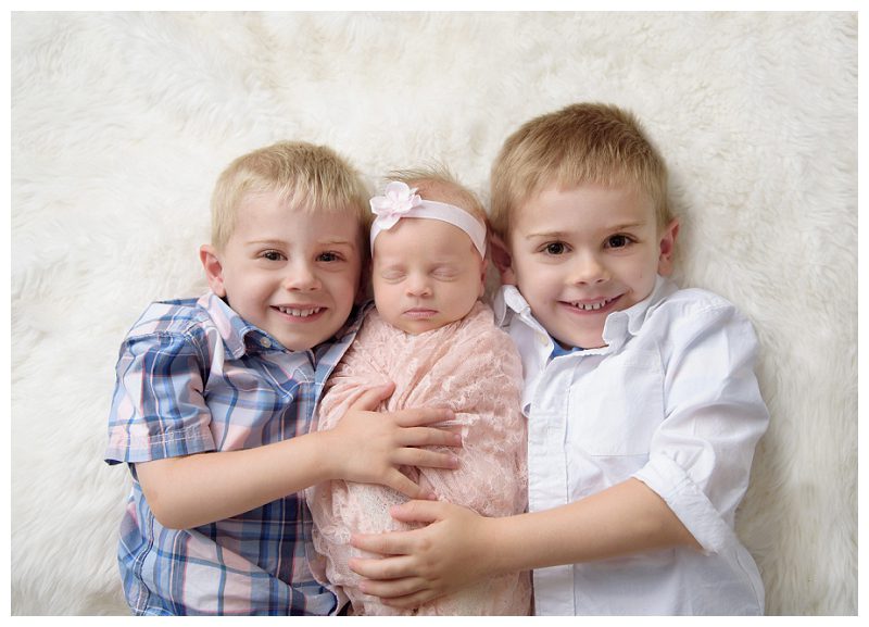 newborn-girl-with-brothers