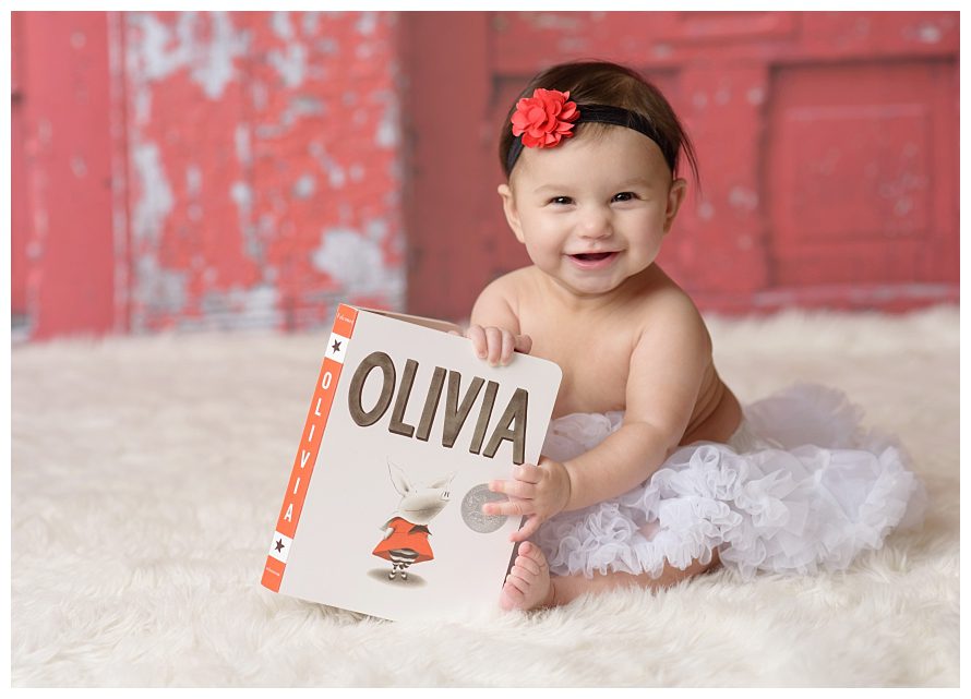 baby-reading-olivia-book