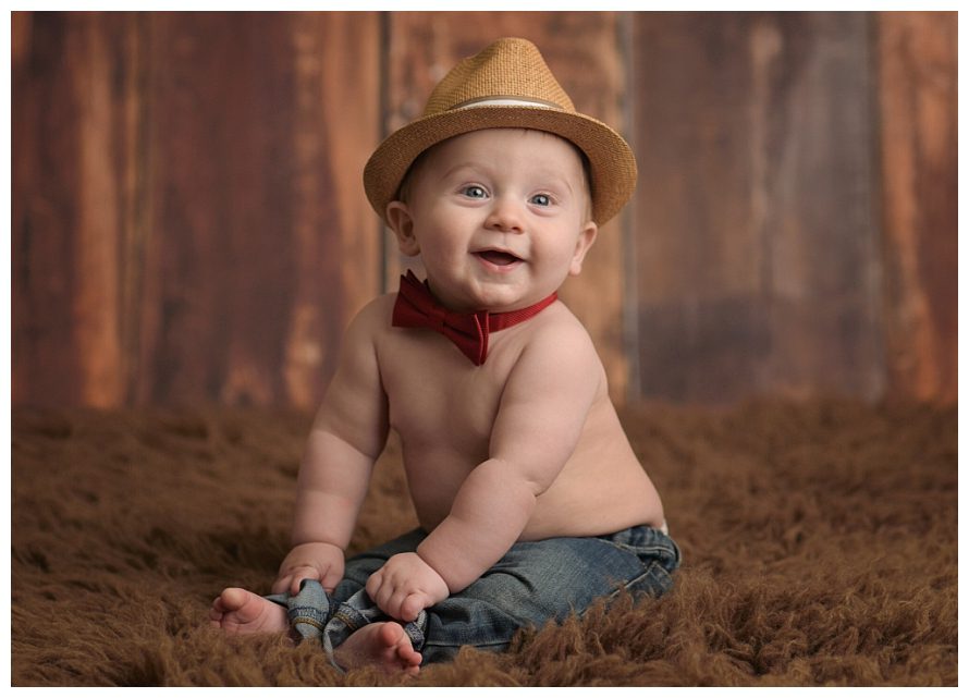 six-month-old-in-straw-hat