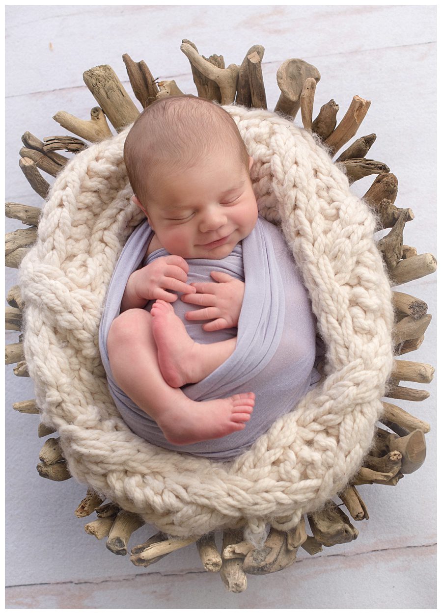 chunky newborn in basket
