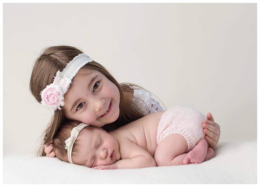 newborn-girl-with-sister