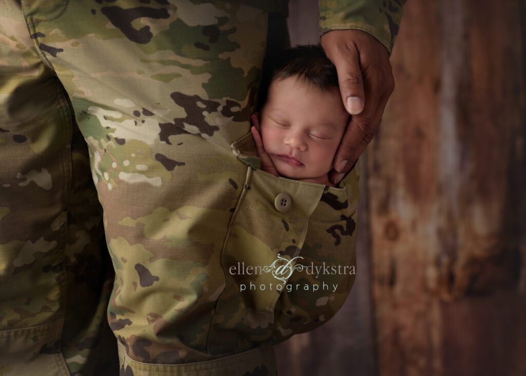picture of military dad with his newborn